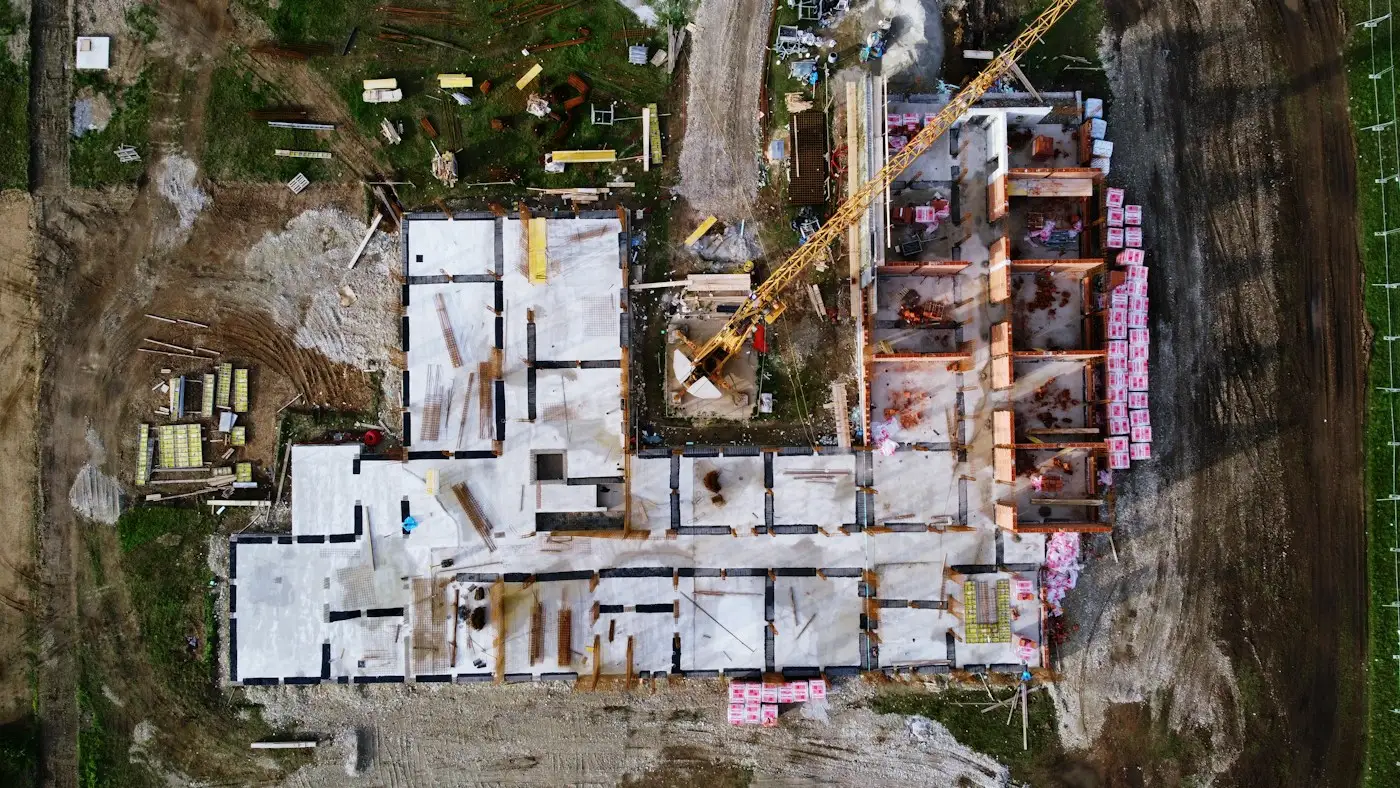 An aerial view of a ground floor going up on a finished slab